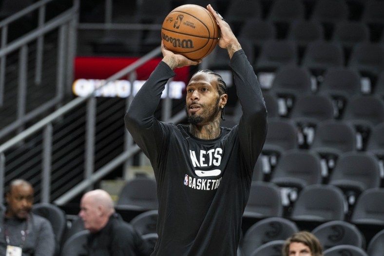 Apr 2, 2022; Atlanta, Georgia, USA; Brooklyn Nets forward James Johnson (16) warms up on the court prior to the game against the Atlanta Hawks at State Farm Arena. Mandatory Credit: Dale Zanine-USA TODAY Sports