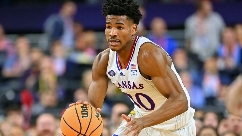 Apr 2, 2022; New Orleans, LA, USA; Kansas Jayhawks guard Ochai Agbaji (30) dribbles the ball against the Villanova Wildcats during the first half during the 2022 NCAA men's basketball tournament Final Four semifinals at Caesars Superdome. Mandatory Credit: Bob Donnan-USA TODAY Sports