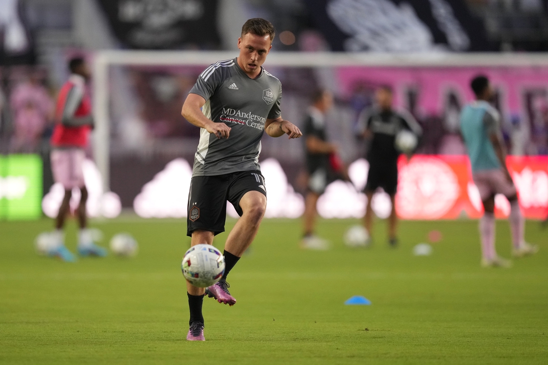 Apr 2, 2022; Fort Lauderdale, Florida, USA; Houston Dynamo forward Corey Baird (11) warms up prior to the match against Inter Miami CF at DRV PNK Stadium. Mandatory Credit: Jasen Vinlove-USA TODAY Sports