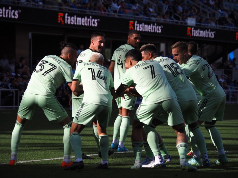 Apr 2, 2022; San Jose, California, USA; Austin FC forward Maximiliano Urruti (37) celebrates with teammates after scoring a goal against the San Jose Earthquakes during the first half at PayPal Park. Mandatory Credit: Kelley L Cox-USA TODAY Sports