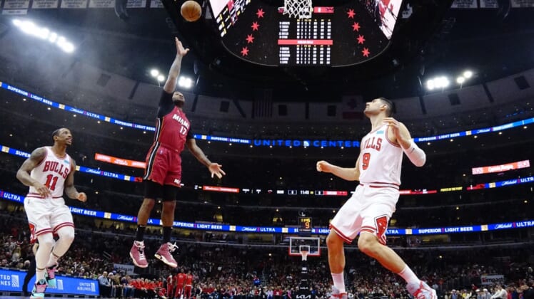 Apr 2, 2022; Chicago, Illinois, USA; Miami Heat forward P.J. Tucker (17) shoots the ball against the Chicago Bulls during the first half at United Center. Mandatory Credit: David Banks-USA TODAY Sports