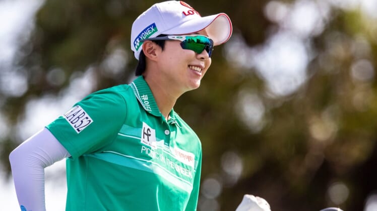 Hyo Joo Kim of South Korea smiles on the seventh tee box before taking her shot during round three of the Chevron Championship at Mission Hills Country Club in Rancho Mirage, Calif., Saturday, April 2, 2022.