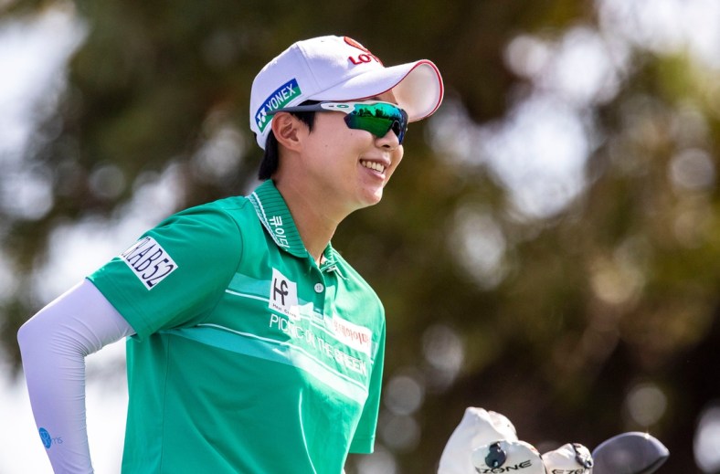 Hyo Joo Kim of South Korea smiles on the seventh tee box before taking her shot during round three of the Chevron Championship at Mission Hills Country Club in Rancho Mirage, Calif., Saturday, April 2, 2022.
