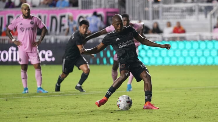 Apr 2, 2022; Fort Lauderdale, Florida, USA; Houston Dynamo midfielder Fafa Picault (10) takes a penalty kick to score a goal against Inter Miami CF during the second half at DRV PNK Stadium. Mandatory Credit: Jasen Vinlove-USA TODAY Sports