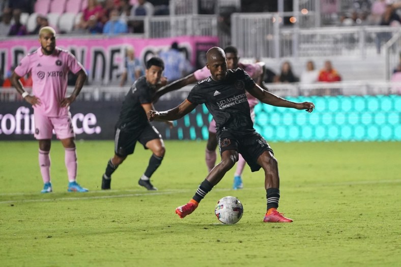 Apr 2, 2022; Fort Lauderdale, Florida, USA; Houston Dynamo midfielder Fafa Picault (10) takes a penalty kick to score a goal against Inter Miami CF during the second half at DRV PNK Stadium. Mandatory Credit: Jasen Vinlove-USA TODAY Sports