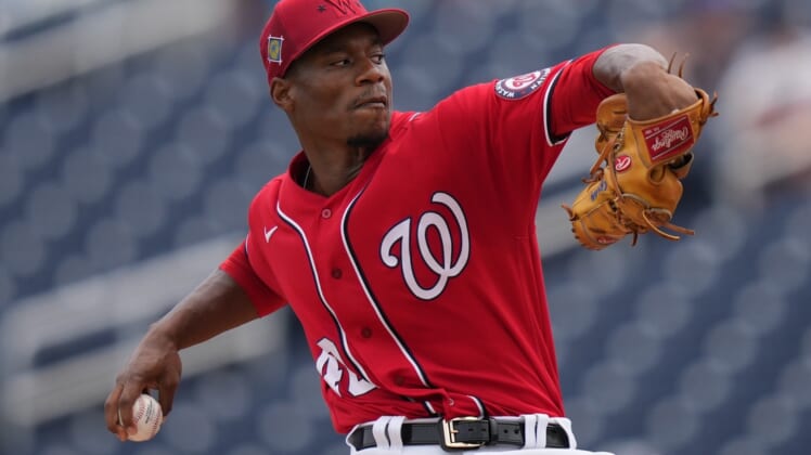 Apr 3, 2022; West Palm Beach, Florida, USA; Washington Nationals starting pitcher Josiah Gray (40) delivers a pitch in the first inning of the spring training game against the Houston Astros at The Ballpark of the Palm Beaches. Mandatory Credit: Jasen Vinlove-USA TODAY Sports