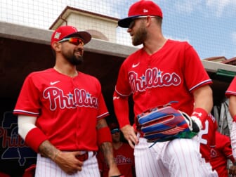Apr 3, 2022; Clearwater, Florida, USA; Philadelphia Phillies right fielder Bryce Harper (3) and left fielder Nick Castellanos (8) interact prior to a game against the Detroit Tigers during spring training at BayCare Ballpark. Mandatory Credit: Nathan Ray Seebeck-USA TODAY Sports