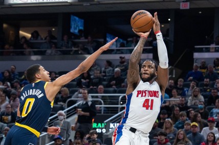 Apr 3, 2022; Indianapolis, Indiana, USA; Detroit Pistons forward Saddiq Bey (41) shoots the ball while Indiana Pacers guard Tyrese Haliburton (0) defends in the first half at Gainbridge Fieldhouse. Mandatory Credit: Trevor Ruszkowski-USA TODAY Sports