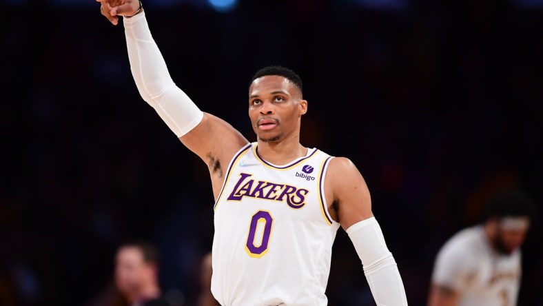 Apr 3, 2022; Los Angeles, California, USA; Los Angeles Lakers guard Russell Westbrook (0) reacts against the Denver Nuggets during the first half at Crypto.com Arena. Mandatory Credit: Gary A. Vasquez-USA TODAY Sports