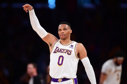 Apr 3, 2022; Los Angeles, California, USA; Los Angeles Lakers guard Russell Westbrook (0) reacts against the Denver Nuggets during the first half at Crypto.com Arena. Mandatory Credit: Gary A. Vasquez-USA TODAY Sports