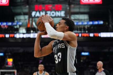 Apr 3, 2022; San Antonio, Texas, USA;  San Antonio Spurs guard Tre Jones (33) shoots in the first half against the Portland Trail Blazers at the AT&T Center. Mandatory Credit: Daniel Dunn-USA TODAY Sports