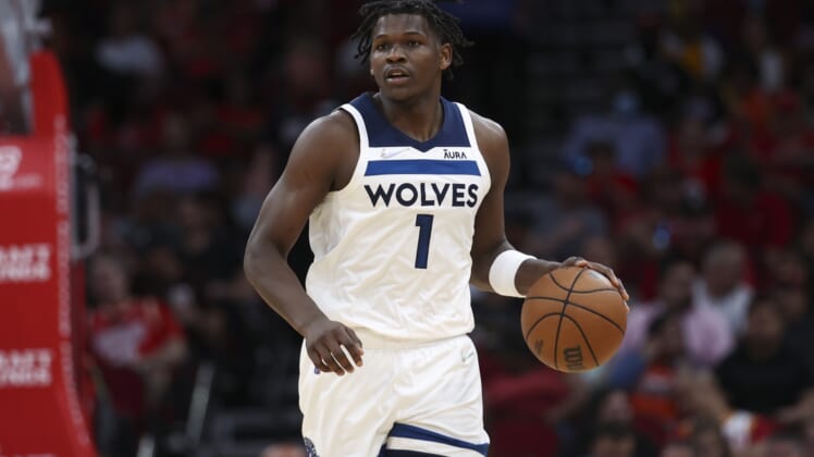 Apr 3, 2022; Houston, Texas, USA; Minnesota Timberwolves forward Anthony Edwards (1) dribbles the ball during the third quarter against the Houston Rockets at Toyota Center. Mandatory Credit: Troy Taormina-USA TODAY Sports