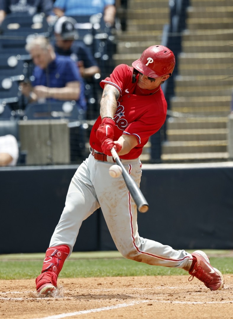 Apr 4, 2022; Tampa, Florida, USA; Philadelphia Phillies center fielder Mickey Moniak (16) singles during the fourth inning against the New York Yankees during spring training at George M. Steinbrenner Field. Mandatory Credit: Kim Klement-USA TODAY Sports