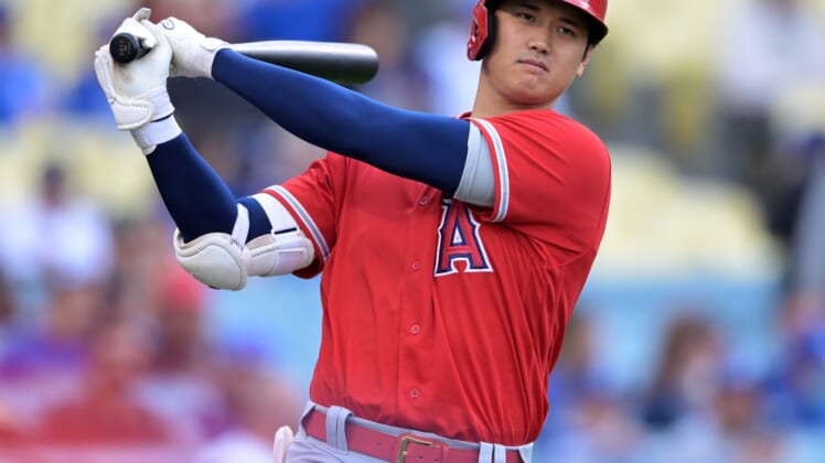 Apr 4, 2022; Los Angeles, California, USA;  Los Angeles Angels starting pitcher Shohei Ohtani (17) in the batting circle before his at bat in the first inning against the Los Angeles Dodgers at Dodger Stadium. Mandatory Credit: Jayne Kamin-Oncea-USA TODAY Sports