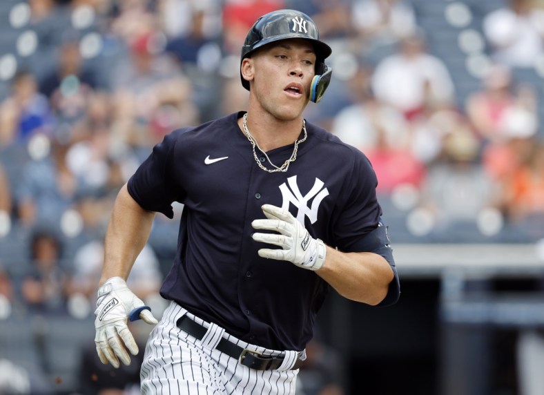 Apr 5, 2022; Tampa, Florida, USA; New York Yankees right fielder Aaron Judge (99) singles during the first inning against the Detroit Tigers during spring training at George M. Steinbrenner Field. Mandatory Credit: Kim Klement-USA TODAY Sports
