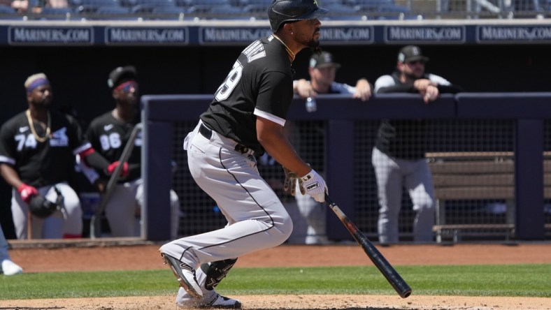 Apr 5, 2022; Peoria, Arizona, USA; Chicago White Sox first baseman Jose Abreu (79) hits against the San Diego Padres in the third inning during a spring training game at Peoria Sports Complex. Mandatory Credit: Rick Scuteri-USA TODAY Sports