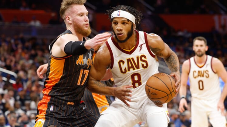 Apr 5, 2022; Orlando, Florida, USA;  Cleveland Cavaliers forward Lamar Stevens (8) drives to the basket guarded by Orlando Magic forward Ignas Brazdeikis (17) in the first half at Amway Center. Mandatory Credit: Nathan Ray Seebeck-USA TODAY Sports