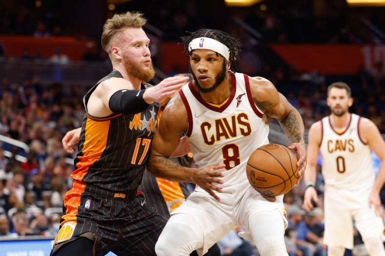 Apr 5, 2022; Orlando, Florida, USA;  Cleveland Cavaliers forward Lamar Stevens (8) drives to the basket guarded by Orlando Magic forward Ignas Brazdeikis (17) in the first half at Amway Center. Mandatory Credit: Nathan Ray Seebeck-USA TODAY Sports