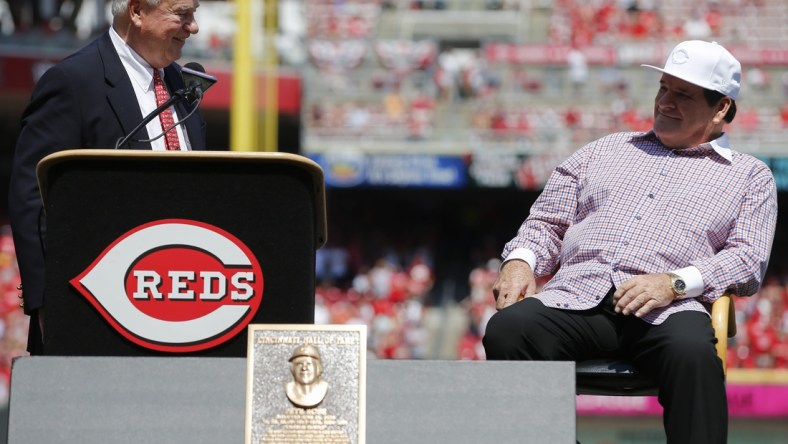 Cincinnati Reds president Bob Castellini and 2016 Reds Hall of Fame inductee Pete Rose share a laugh during pregame ceremonies before the MLB game between the San Diego Padres and Cincinnati Reds, Saturday, June 25, 2016, at Great American Ball Park in Cincinnati.