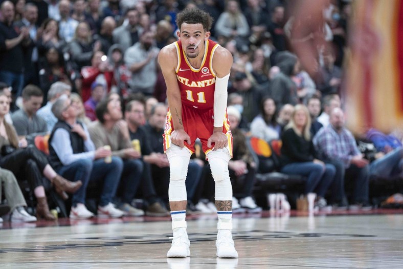 Apr 5, 2022; Toronto, Ontario, CAN; Atlanta Hawks guard Trae Young (11) waits for the play to begin during the fourth quarter against the Toronto Raptors at Scotiabank Arena. Mandatory Credit: Nick Turchiaro-USA TODAY Sports