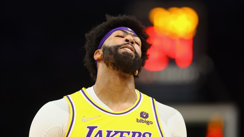 Apr 5, 2022; Phoenix, Arizona, USA; Los Angeles Lakers forward Anthony Davis reacts against the Phoenix Suns at Footprint Center. Mandatory Credit: Mark J. Rebilas-USA TODAY Sports