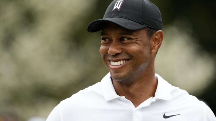 Apr 6, 2022; Augusta, Georgia, USA; Tiger Woods smiles at the practice facility during a practice round of The Masters golf tournament at Augusta National Golf Club. Mandatory Credit: Rob Schumacher-USA TODAY Sports