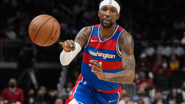 Apr 6, 2022; Atlanta, Georgia, USA; Washington Wizards guard Kentavious Caldwell-Pope (1) passes the ball against the Atlanta Hawks during the first half at State Farm Arena. Mandatory Credit: Dale Zanine-USA TODAY Sports