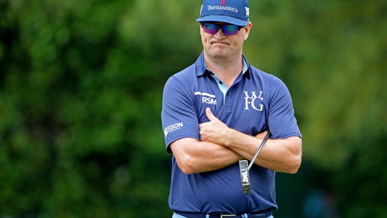 Apr 7, 2022; Augusta, Georgia, USA; Zach Johnson reacts to his putt on the third green during the first round of The Masters golf tournament. Mandatory Credit: Kyle Terada-USA TODAY Sports