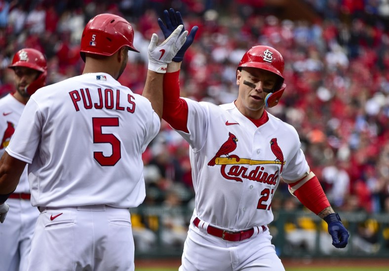 Apr 7, 2022; St. Louis, Missouri, USA;  St. Louis Cardinals left fielder Tyler O'Neill (27) is congratulated by designated hitter Albert Pujols (5) after hitting a three run home run against the Pittsburgh Pirates during the second inning of Opening Day at Busch Stadium. Mandatory Credit: Jeff Curry-USA TODAY Sports