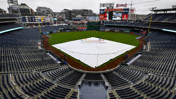 Apr 7, 2022; Washington, District of Columbia, USA; General view of tarp on the field before the game between the Washington Nationals and the New York Mets at Nationals Park. Mandatory Credit: Brad Mills-USA TODAY Sports