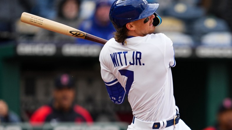 Apr 7, 2022; Kansas City, Missouri, USA; Kansas City Royals third baseman Bobby Witt Jr. (7) hits a go-ahead RBI double during the eighth inning against the Cleveland Guardians at Kauffman Stadium. Mandatory Credit: Jay Biggerstaff-USA TODAY Sports