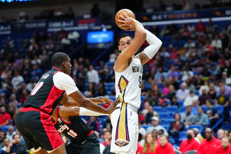 Apr 7, 2022; New Orleans, Louisiana, USA; New Orleans Pelicans center Willy Hernangomez (9) battles for position against Portland Trail Blazers forward Reggie Perry (10) during the second quarter at Smoothie King Center. Mandatory Credit: Andrew Wevers-USA TODAY Sports