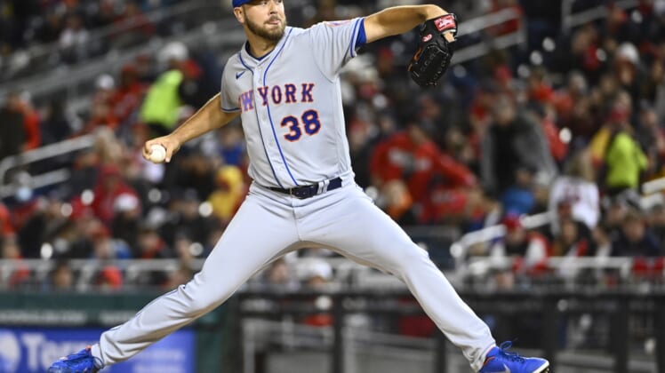 Apr 7, 2022; Washington, District of Columbia, USA; New York Mets pitcher Tylor Megill (38) throws a pitch against the Washington Nationals during the first inning at Nationals Park. Mandatory Credit: Brad Mills-USA TODAY Sports