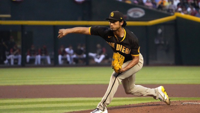 Apr 7, 2022; Phoenix, Arizona, USA; San Diego Padres starting pitcher Yu Darvish (11) pitches against the Arizona Diamondbacks during the first inning at Chase Field. Mandatory Credit: Joe Camporeale-USA TODAY Sports