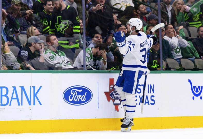 Apr 7, 2022; Dallas, Texas, USA; Toronto Maple Leafs center Auston Matthews (34) celebrates scoring the game winning goal against the Dallas Stars during the overtime period at the American Airlines Center. Mandatory Credit: Jerome Miron-USA TODAY Sports