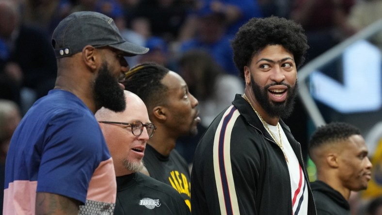 Apr 7, 2022; San Francisco, California, USA; Los Angeles Lakers forward Anthony Davis (right) talks to forward LeBron James (left) during the second quarter against the  Golden State Warriors at Chase Center. Mandatory Credit: Darren Yamashita-USA TODAY Sports