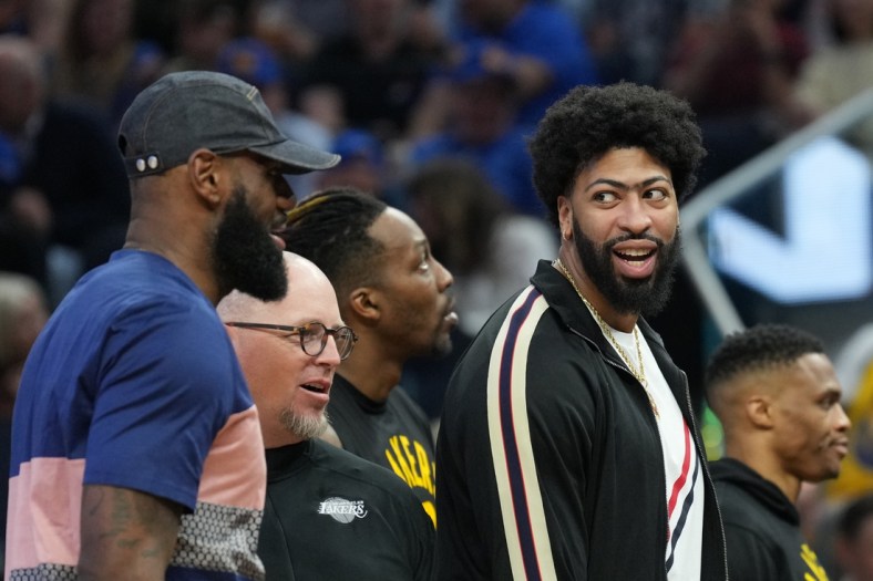Apr 7, 2022; San Francisco, California, USA; Los Angeles Lakers forward Anthony Davis (right) talks to forward LeBron James (left) during the second quarter against the  Golden State Warriors at Chase Center. Mandatory Credit: Darren Yamashita-USA TODAY Sports