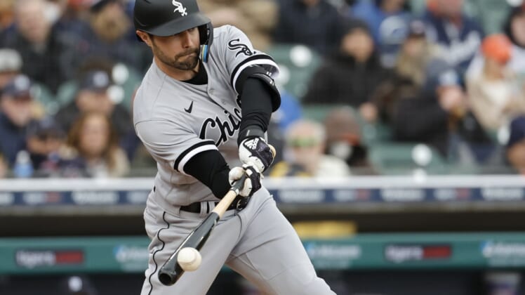 Apr 8, 2022; Detroit, Michigan, USA;  Chicago White Sox left fielder AJ Pollock (18) hits an RBI double in the second inning against the Detroit Tigers at Comerica Park. Mandatory Credit: Rick Osentoski-USA TODAY Sports