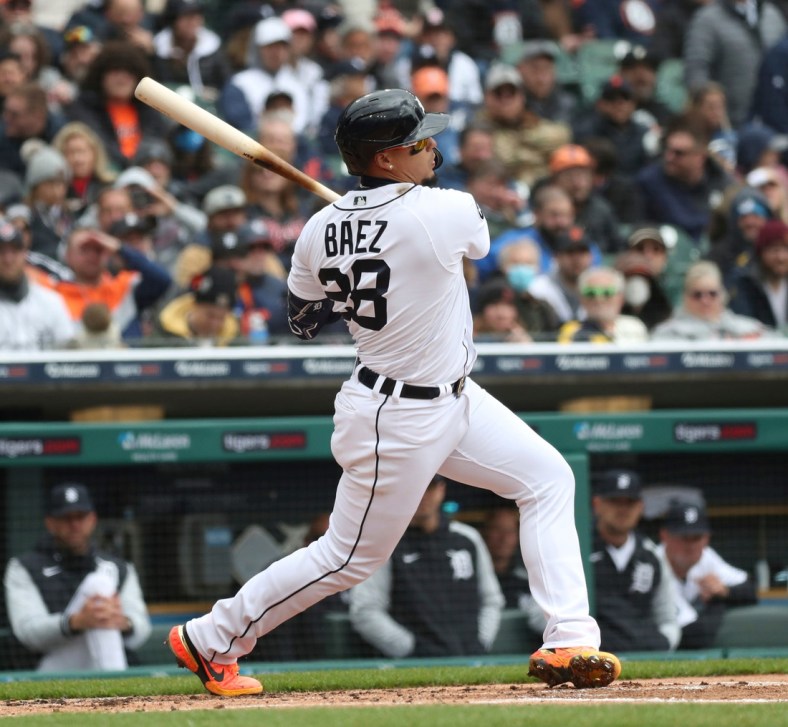 Tigers shortstop Javier Baez bats against White Sox pitcher Lucas Giolito during the first inning on Friday, April 8, 2022, at Comerica Park.

Tigers Chiwht