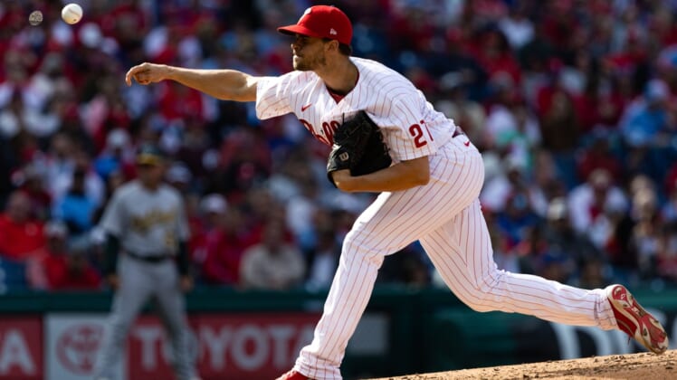 Apr 8, 2022; Philadelphia, Pennsylvania, USA; Philadelphia Phillies starting pitcher Aaron Nola (27) throws a pitch during the fourth inning against the Oakland Athletics at Citizens Bank Park. Mandatory Credit: Bill Streicher-USA TODAY Sports