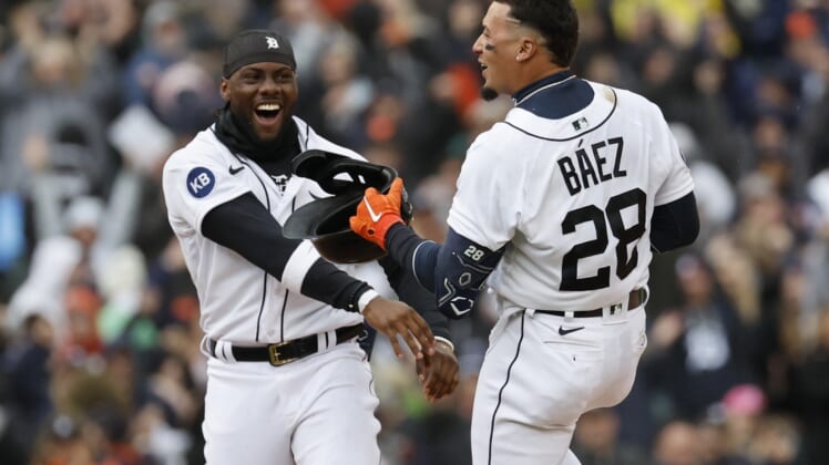 Apr 8, 2022; Detroit, Michigan, USA;  Detroit Tigers shortstop Javier Baez (28) receives congratulations from center fielder Akil Baddoo (60) after he hits an walk off RBI single in the ninth inning against the Chicago White Sox at Comerica Park. Mandatory Credit: Rick Osentoski-USA TODAY Sports