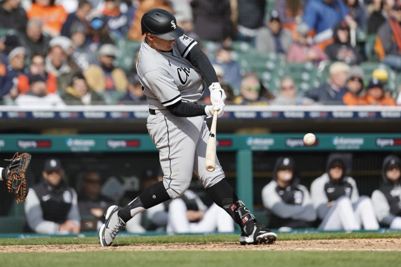 Apr 8, 2022; Detroit, Michigan, USA;  Chicago White Sox designated hitter Andrew Vaughn (25) hits a home run in the ninth inning against the Detroit Tigers at Comerica Park. Mandatory Credit: Rick Osentoski-USA TODAY Sports