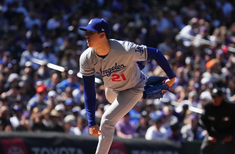Apr 8, 2022; Denver, Colorado, USA; Los Angeles Dodgers starting pitcher Walker Buehler (21) throws the ball in the first inning against the Colorado Rockies at Coors Field. Mandatory Credit: Ron Chenoy-USA TODAY Sports