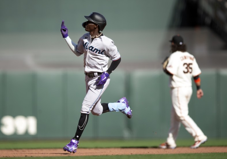 Apr 8, 2022; San Francisco, California, USA; Miami Marlins second baseman Jazz Chisholm Jr. (2) gestures as he runs out his two-run home run against the San Francisco Giants during the ninth inning at Oracle Park. Mandatory Credit: D. Ross Cameron-USA TODAY Sports