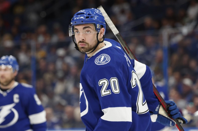 Apr 8, 2022; Tampa, Florida, USA;  Tampa Bay Lightning left wing Nicholas Paul (20) listens to a referee during the second period against the Boston Bruins at Amalie Arena. Mandatory Credit: Reinhold Matay-USA TODAY Sports