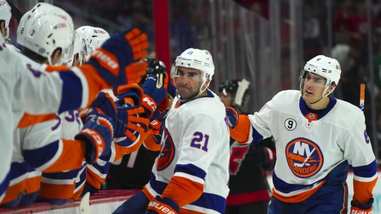 Apr 8, 2022; Raleigh, North Carolina, USA;  New York Islanders right wing Kyle Palmieri (21) celebrates his goal against the Carolina Hurricanes during the third period at PNC Arena. Mandatory Credit: James Guillory-USA TODAY Sports
