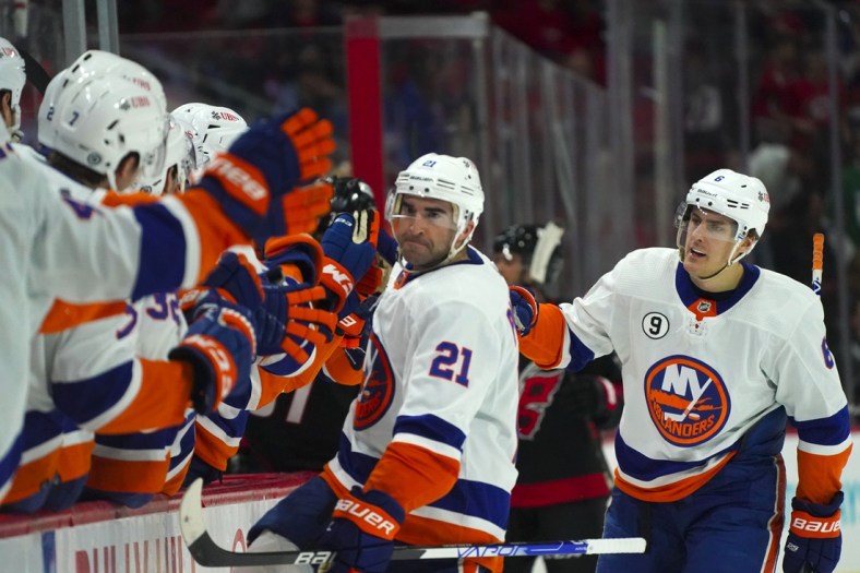 Apr 8, 2022; Raleigh, North Carolina, USA;  New York Islanders right wing Kyle Palmieri (21) celebrates his goal against the Carolina Hurricanes during the third period at PNC Arena. Mandatory Credit: James Guillory-USA TODAY Sports