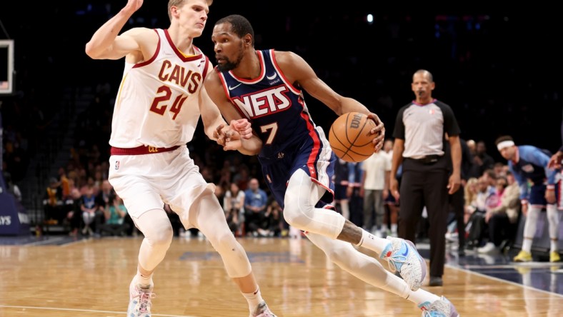 Apr 8, 2022; Brooklyn, New York, USA; Brooklyn Nets forward Kevin Durant (7) drives to the basket against Cleveland Cavaliers forward Lauri Markkanen (24) during the fourth quarter at Barclays Center. Mandatory Credit: Brad Penner-USA TODAY Sports