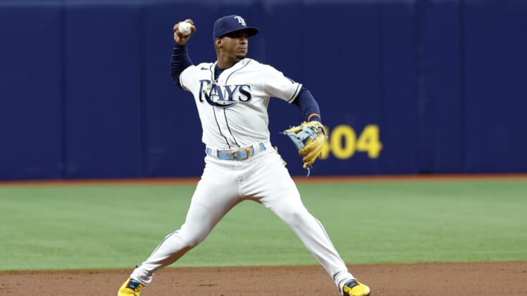 Apr 9, 2022; St. Petersburg, Florida, USA; Tampa Bay Rays shortstop Wander Franco (5) throws the ball to first base for an out during the first inning against the Baltimore Orioles at Tropicana Field. Mandatory Credit: Kim Klement-USA TODAY Sports