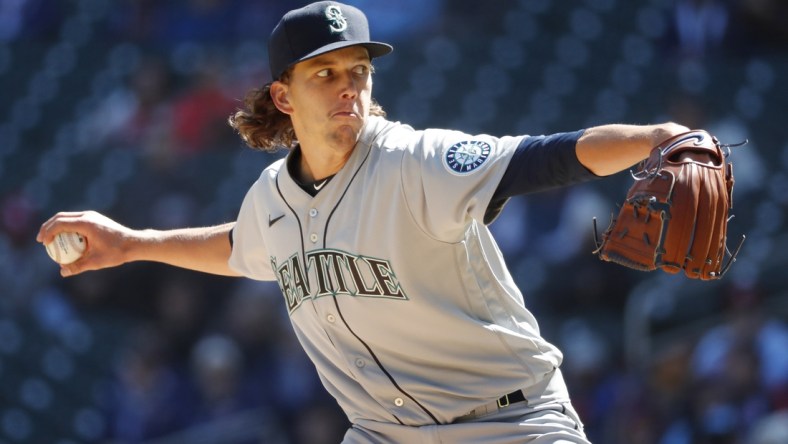 Apr 9, 2022; Minneapolis, Minnesota, USA; Seattle Mariners starting pitcher Logan Gilbert (36) throws to the Minnesota Twins in the third inning at Target Field. Mandatory Credit: Bruce Kluckhohn-USA TODAY Sports